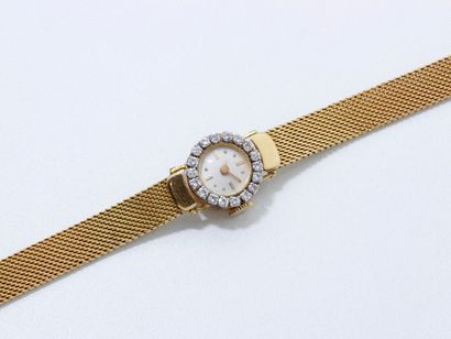 null Montre bracelet de dame en or 750 millièmes, cadran argenté avec index appliqués,...
