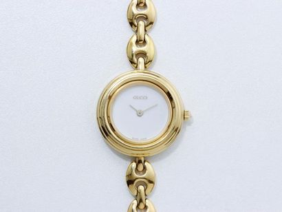 GUCCI ''Timeless Heritage''. Montre bracelet de dame en métal doré, cadran blanc....