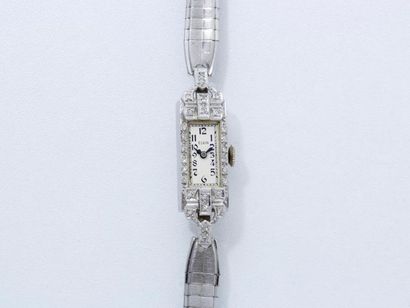 ELGIN Montre bracelet de dame en platine 850 millièmes, cadran argenté avec chiffres...