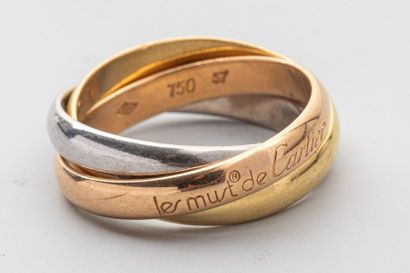 null CARTIER, modèle "Trinity". Bague trois anneaux entrelacés en or 18K de trois...