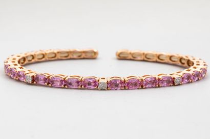 null 18k yellow gold bracelet with oval cut pink sapphires and diamonds, Gross weight:...