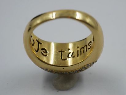 null 18k yellow gold ball ring set with a pavement of diamonds, bears an inscription...