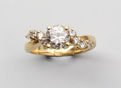 null Ring in 18k yellow gold set with a diamond of about 0.90 carat with two lines...