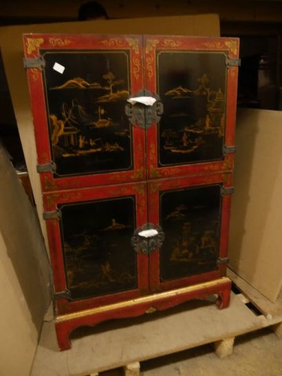 null Red and black lacquered wooden cupboard with lake scenery decor, opening with...