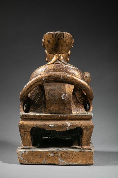 null CHINA, Figure of a scholar sitting on an armchair, holding the sceptre ruyi...