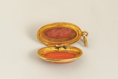 null 18k yellow gold and coral pendant, Gross weight: 7,4 g