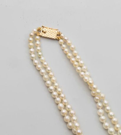null Double strand necklace of Japanese cultured pearls falling from 2 to 5mm, Length:...