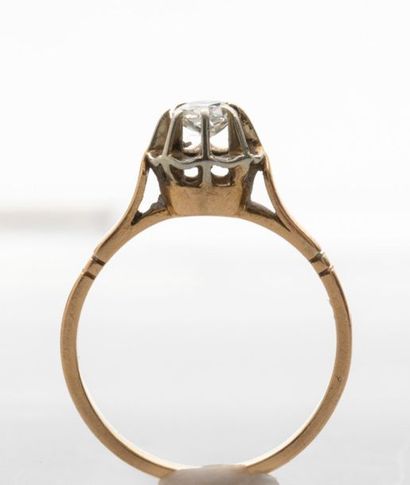 null Solitaire in 18k yellow gold surmounted by an antique cut diamond of about 0.20cts...