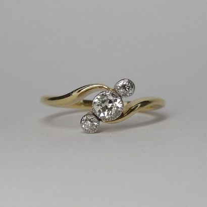 null Trilogy ring in 18k yellow gold set with 3 old cut diamonds for about 0.25cts...
