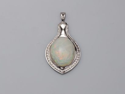 null Pendant drop in chased white gold 9k surmounted by an important round opal in...