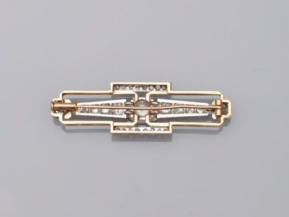 null Art Deco bar brooch in 18k yellow gold and openwork platinum surmounted by a...