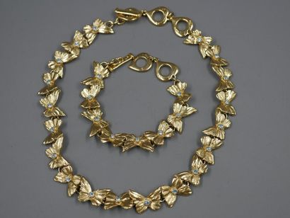 null YVES SAINT LAURENT - Gold plated metal set made up of a necklace and a butterflies...
