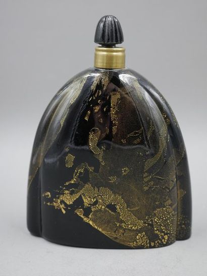 null Lentheric perfumer. Miracle. Opaque black glass bottle, powdered with gold....