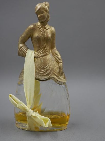 null ED. Pinaud. Scarlette O'Hara. Moulded colourless pressed glass bottle with gold-coloured...