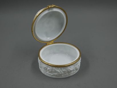 null Circular biscuit box with a vestal and putti decorations on the lid and swans...