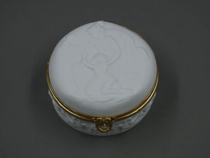 null Circular biscuit box with a vestal and putti decorations on the lid and swans...