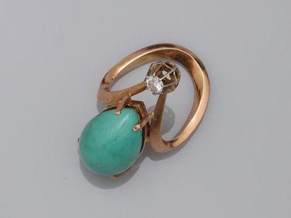null Design ring in 18k yellow gold set with a turquoise cabochon in the shape of...
