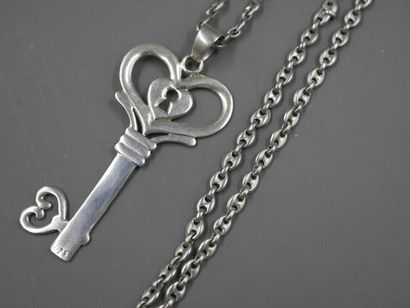null Pendant silver key held by a silver chain mesh coffee bean - PB: 28,80gr - Length:...