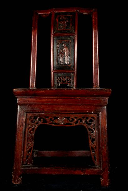 null China, 20th century. Lacquered wood chair with openwork back decorated with...
