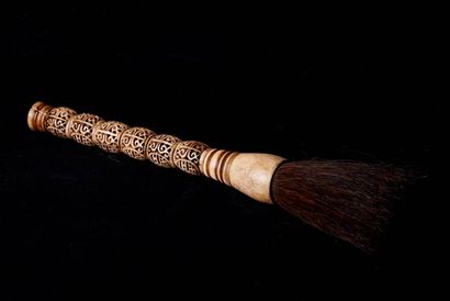 null China or Indochina, 20th century. Calligraphy brush with carved handle. 

L...