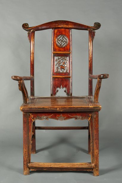 null China, 20th century. Wooden armchair, with openwork back carved with deer and...