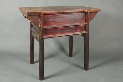 null China, 20th century. Small work table opening with a carved drawer in front....
