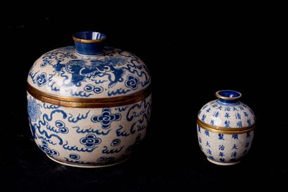 null China, 20th century. Two blue-white enamelled porcelain covered pots on a crackled...