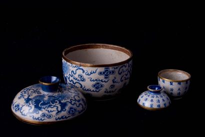 null China, 20th century. Two blue-white enamelled porcelain covered pots on a crackled...