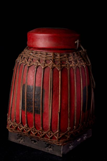 null Southeast Asia, 20th century. Lacquered wood and rattan box for storing rice....