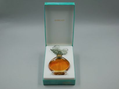 null Guerlain. Ornament. Glass bottle titled Parfum d'origine. Box and counter box...