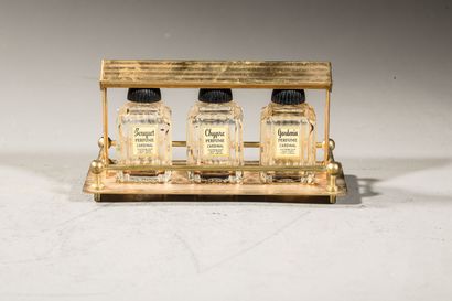 null CARDINAL Small gilded metal display case containing 3 empty glass bottles, labels...