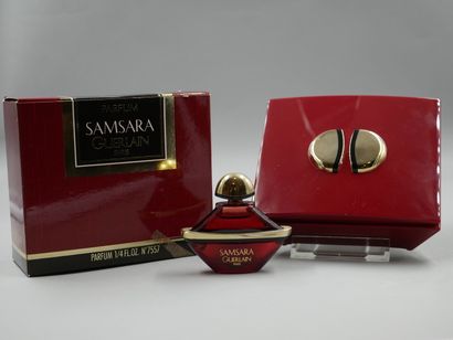 null Guerlain. Samsara. Red glass bottle titled in gold lettering. Perfume extract...