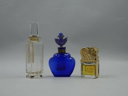 null Set of 3 bottles including "Amun" by Mülhens, a sculptural golden glass bottle...