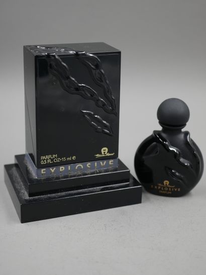 null Etienne Aigner. Explosiv Black glass bottle decorated in relief on both sides....