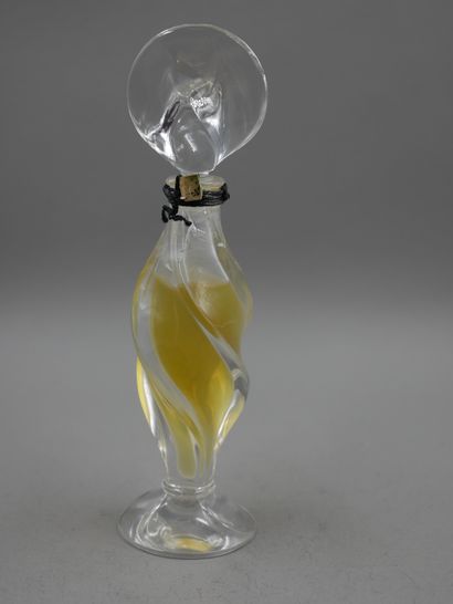 null Perfumer D'Orsay. Divine. Molded colourless pressed glass bottle with a cylindrical...