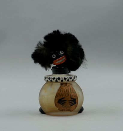 null VIGNY " The Golliwogg "

Glass bottle, representing a small character. The stopper...