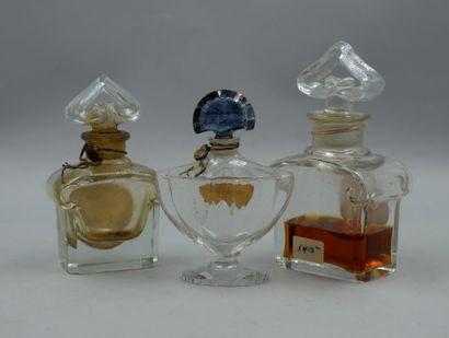 null GUERLAIN

2 vials with heart cap. Including 1 bottle titled "L'heure bleue"...