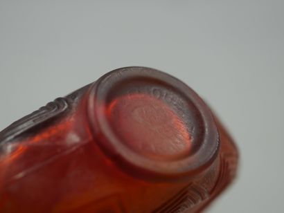 null WORTH LALIQUE " Towards the Day "

Bottle in amber-tinted glass, blow-moulded,...