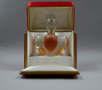 null Nina Ricci. Fierce. PDO. Titled cloth box, signed Lalique France and Nina Ricci....