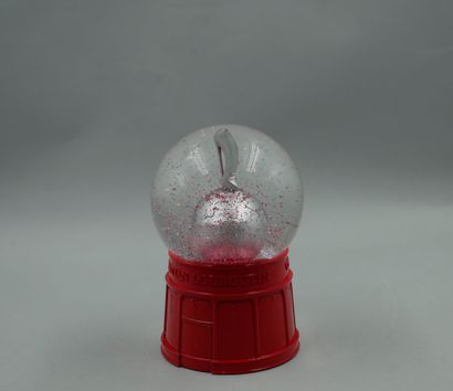 null CHRISTIAN LOUBOUTIN 2020 - Snow globe featuring a stilleto overhanging a red...