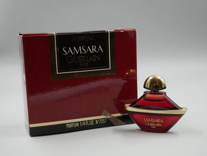 Guerlain. Samsara. Red glass bottle titled...