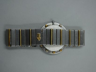 null 
CORUM - Montre bracelet de dame en acier et or jaune 18k - PB: 57,3gr
