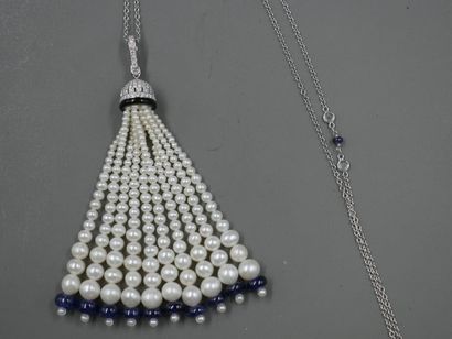 null 
Sautoir Bayadère en or blanc 18k la chaine agrémentée de perles de saphirs...