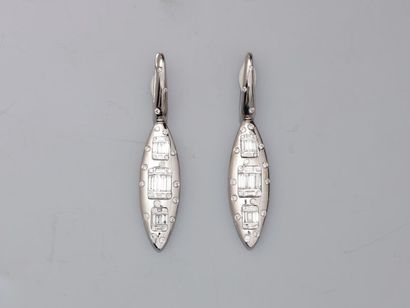 null Pair of modernist earrings in 18k white gold in the shape of a drop decorated...