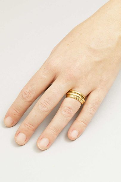 null PIAGET - Wedding band in 18k yellow gold including a mobile ring - Signed -...