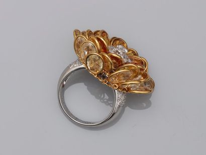 null Flower ring in 18k yellow and white gold, the petals in mobile yellow sapphire...