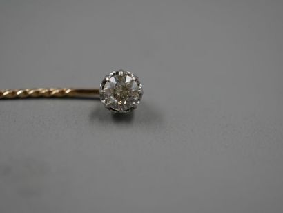 Tie pin in 18k yellow gold decorated with...