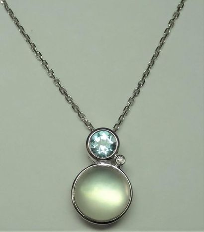 null 18k white gold pendant set with a mother-of-pearl under a crystal cabochon surmounted...