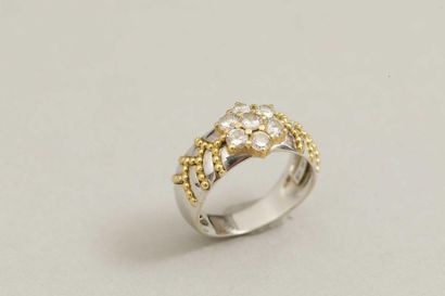 null Wedding band in 18k white gold adorned with yellow gold pearl threads and surmounted...