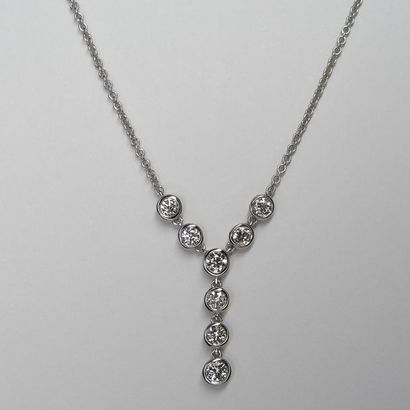 null Necklace Design "Atom" in 18k white gold with a design surmounted by eight diamonds...